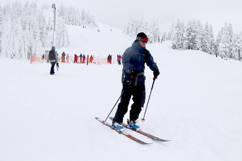 Patrick Brusven of Port Angeles skis at Hurricane Ridge on Sunday morning. There was a reported 63 inches at the Ridge, which is up to 35 percent of needed water supply, up from 29 percent a week ago. On Saturday, 240 cars made the trek up the mountain for the opening of ski season. (Dave Logan/for Peninsula Daily News)