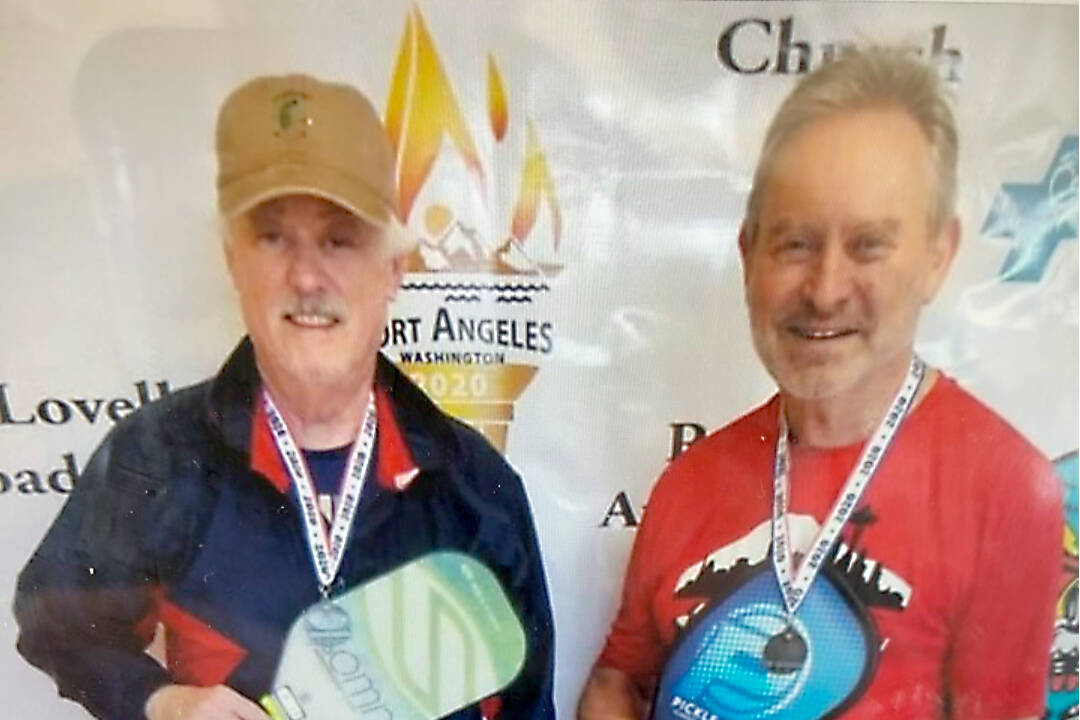 From left, John Doherty and Chris Berry were the men's doubles 3.0 gold medal winners at the Olympic Pickleball Tournament.