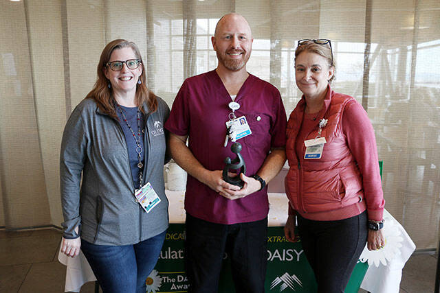 Pictured, from left, are Denise Harman, director of medical/surgical/pediatrics; Casey Peterson, DAISY award recipient; and Vickie Swanson, chief nursing officer.