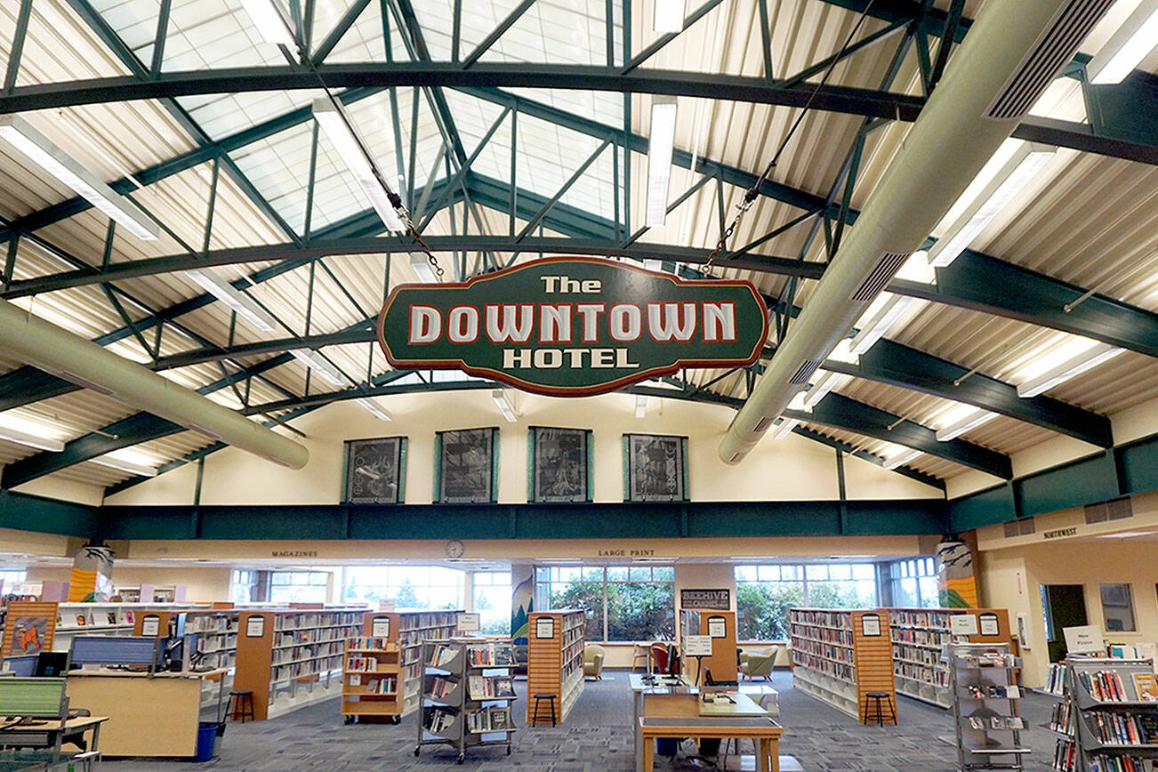 The Downtown Hotel sign is one of several vintage signs on display at the Port Angeles Main Library.