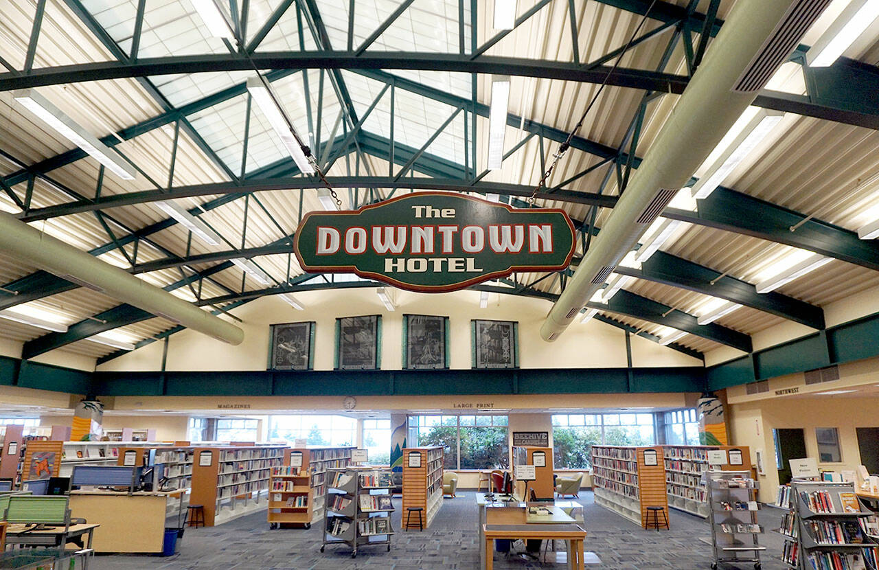 The Downtown Hotel sign is one of several vintage signs on display at the Port Angeles Main Library.