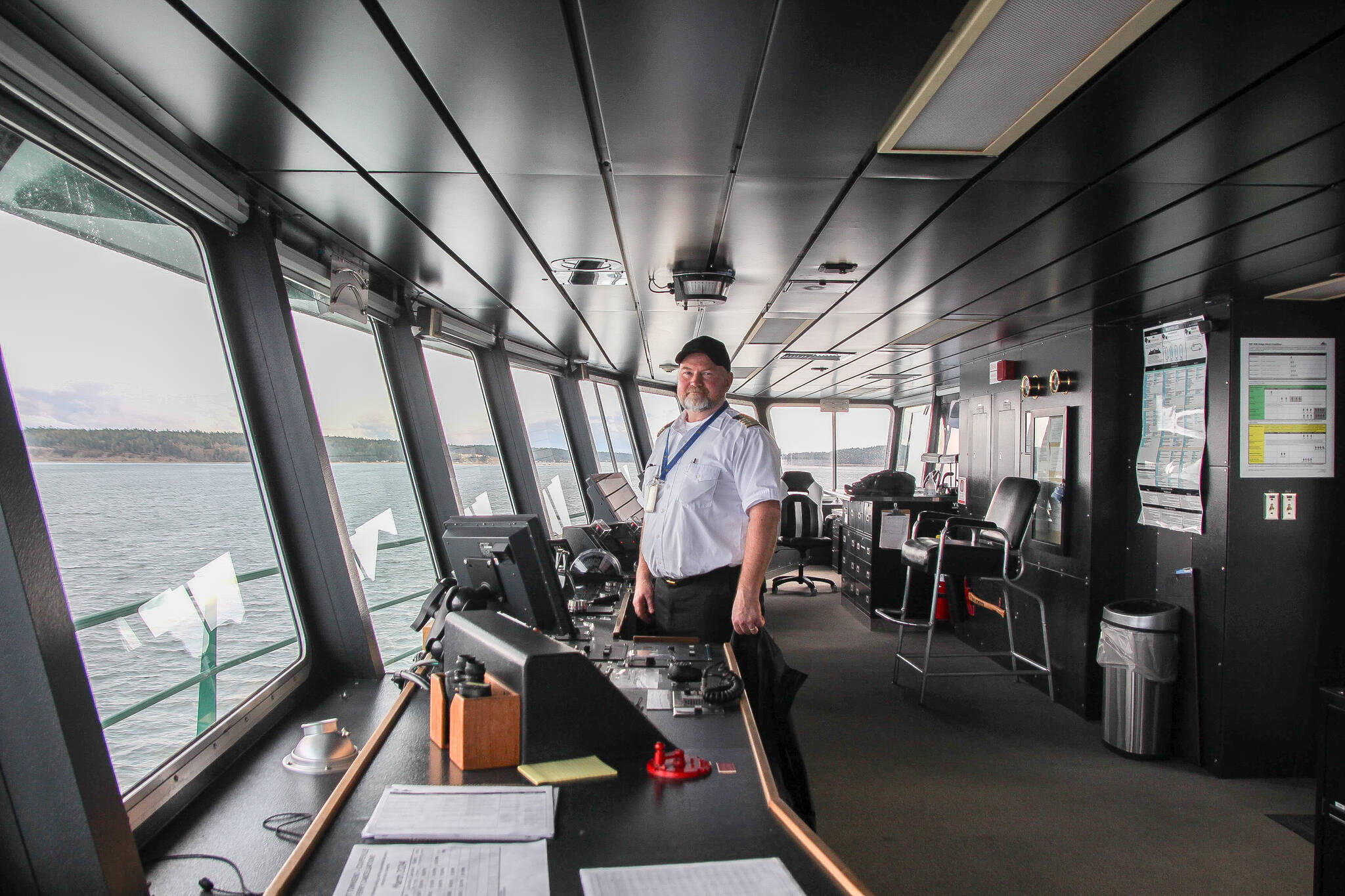 Luisa Loi / Whidbey News Group
Captain Mark Gripp smiles surrounded by the displays and controls in the Kennewick’s pilothouse, moments before leaving Keystone Harbor.