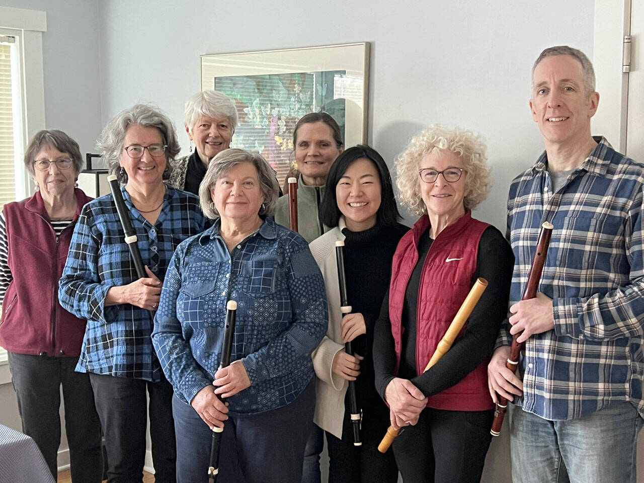 From left to right are flutists Mary Ann Hagan, Janet See, Molly Warner, Marty Ronish, Liz Hunter, Nayoung Ham, Carla Lawrence and Miguel Rodé.