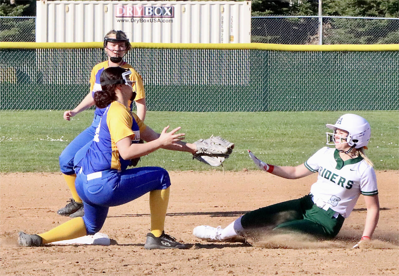 Dave Logan/for Peninsula Daily News Port Angeles Heidi Leitz tries to steal second base against the Bremerton Knights, but was called out on this play. The Roughriders won 11-1, ending the game on a walkoff two-run home run by Natalie Robinson.