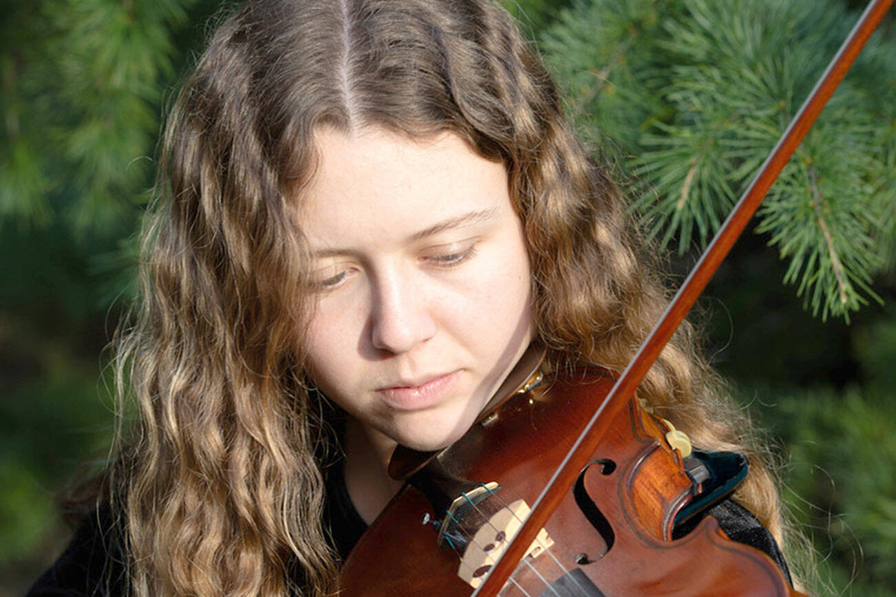 Zia Magill will perform a violin solo on Sunday at Chimacum High School as part of the Port Townsend Symphony Orchestra’s April concert. (Jessica Plumb)