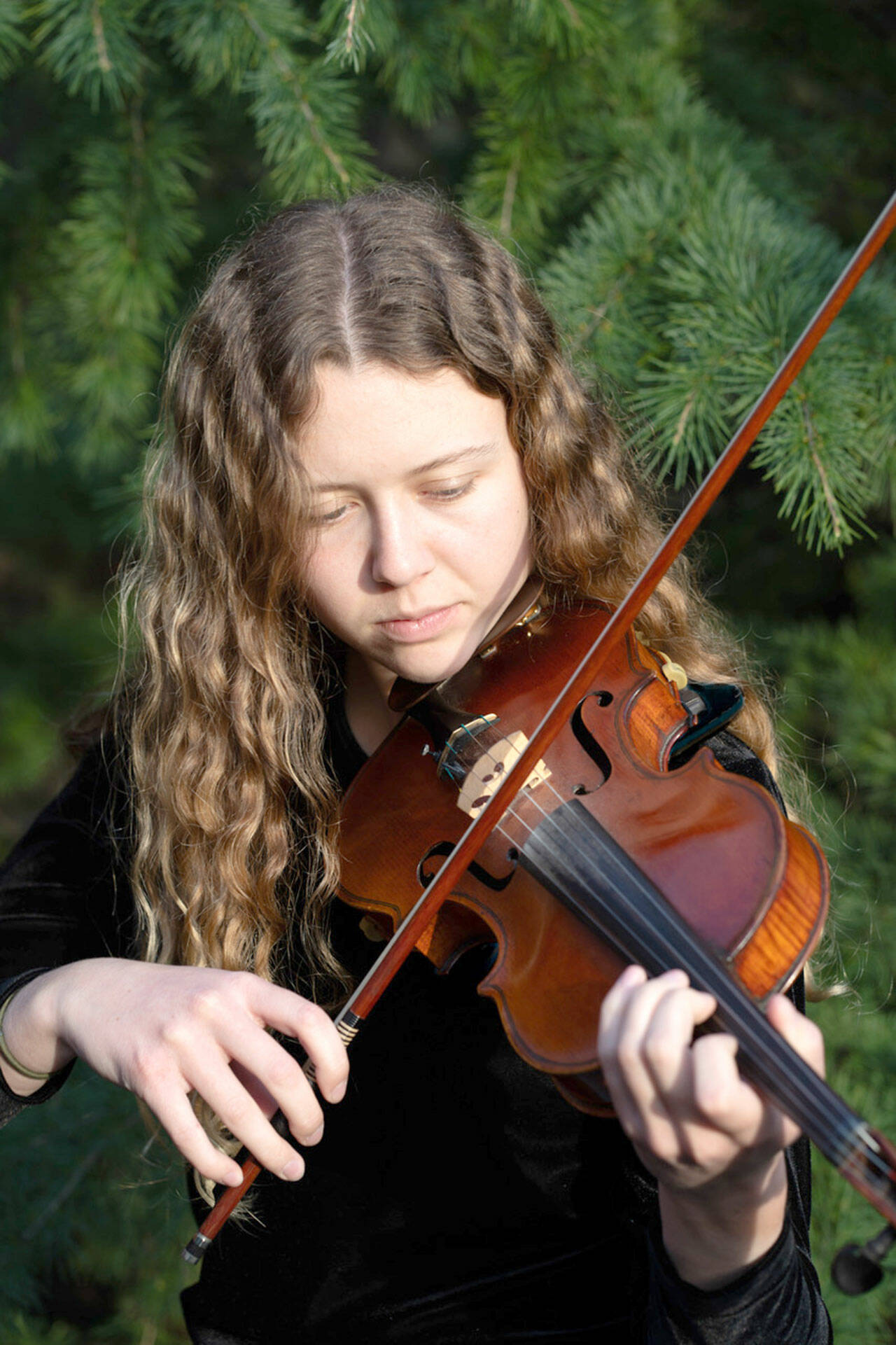 Zia Magill will perform a violin solo on Sunday at Chimacum High School as part of the Port Townsend Symphony Orchestra’s April concert. (Jessica Plumb)