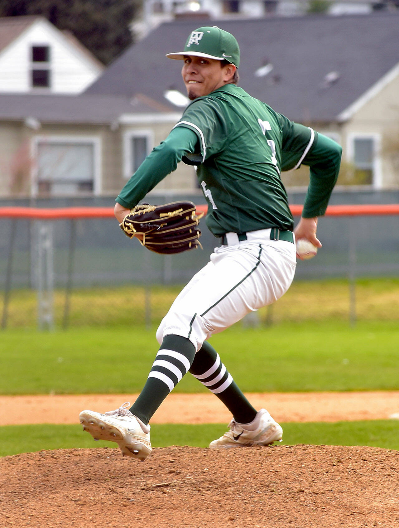 Port Angeles pitcher Brian Guttormsen throws in the first inning against Peninsula on Saturday at Port Angeles Civic Field. (KEITH THORPE/PENINSULA DAILY NEWS)