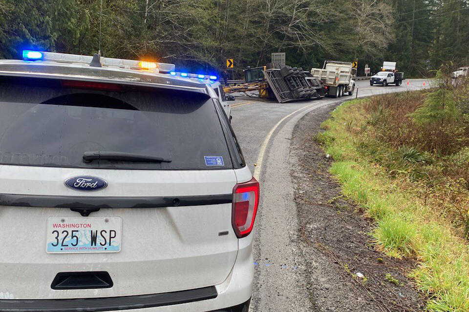 Katherine Weatherwax/Washington State Patrol via X
U.S. Highway 101 is fully blocked at MP 177 for a roll over collision involving a trailer hauling an excavator.