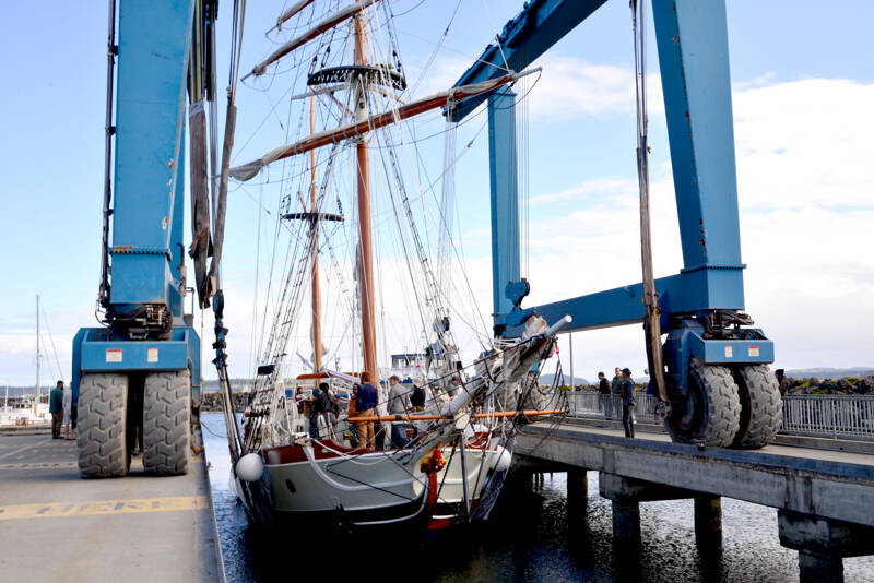 The Hawaiian Chieftain, a 103-foot sailing ship, was returned to the water Tuesday after it spent several years being restored at the Port of Port Townsend Boat Haven. The ship, purchased from the Grays Harbor Historical Society by Aubrey and Matt Wilson, will now return to Hawaii, where it will be available for tours and events. (Peter Segall/Peninsula Daily News)