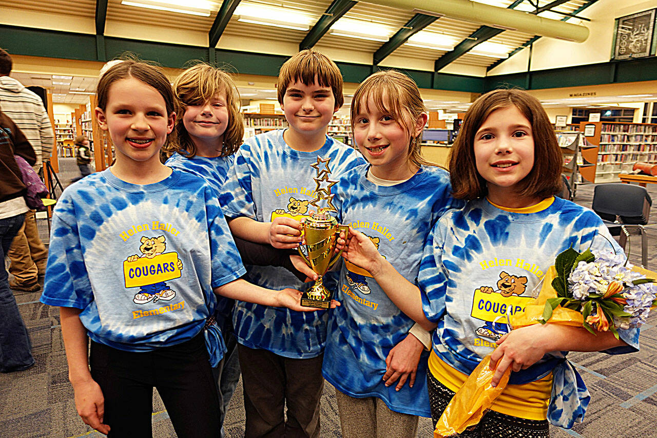 The Blue Titans, from left, Ramsey O’Mera, Miles Angelovic, Winter Radcliffe, Rain Nelson and Mia Miano won the 2024 Battle of the Books on March 22. The fourth-graders represented Sequim’s Helen Haller Elementary School. (North Olympic Library System)