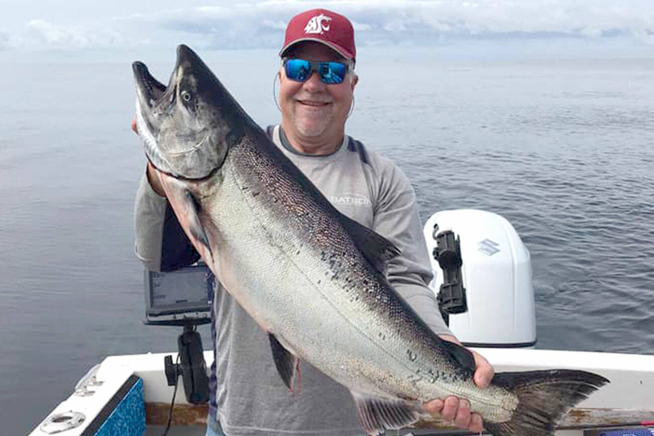 For Outdoors-PDN-240412
Dave Johnson caught this chinook while fishing off of Neah Bay. The Pacific Fishery Management Council adopted ocean salmon season recommendations on Wednesday.