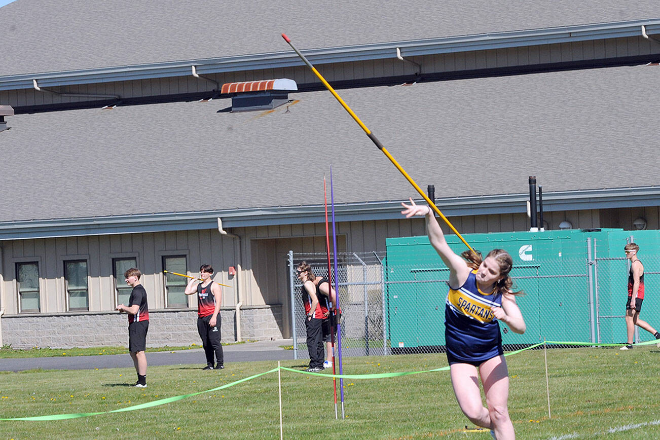 Forks' Peyton Johnson throws the Javelin during the annual Forks Lions Clubs' track and field meet at Spartan Stadium on Saturday. Johnson was the winner of the girls' javelin. (Lonnie Archibald/for Peninsula Daily News)