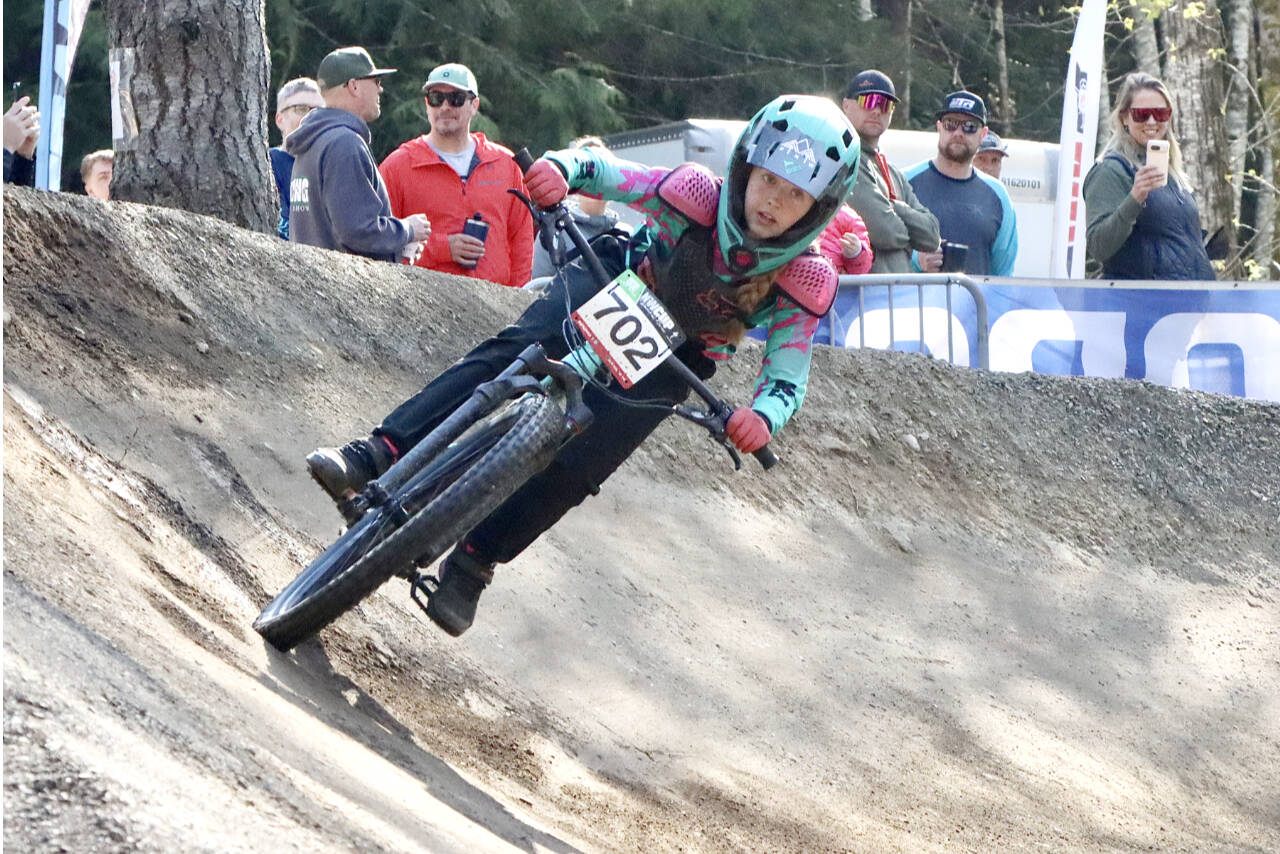 Cadence Sinclair, in the Cat 3 Women 11 to 14 age group, took first place Dry Hill mountain bike course west of Port Angeles on Sunday for the third day of the Northwest Cup. She is from Sweet Home, Ore. (Dave Logan/for Peninsula Daily News)