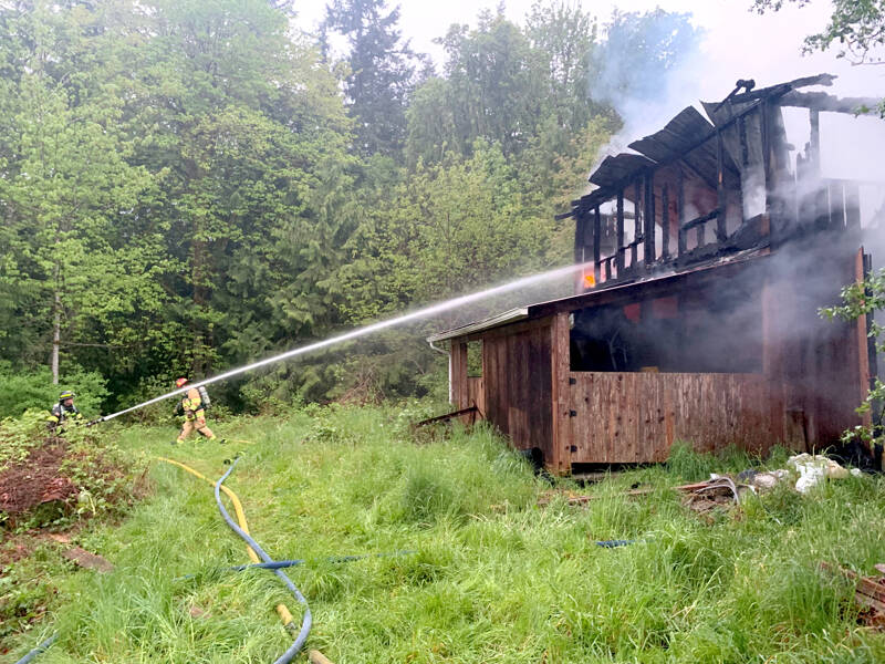 Firefighters from East Jefferson Fire and Rescue battle a two-story barn fire Sunday on Gibbs Road. (East Jefferson Fire and Rescue)