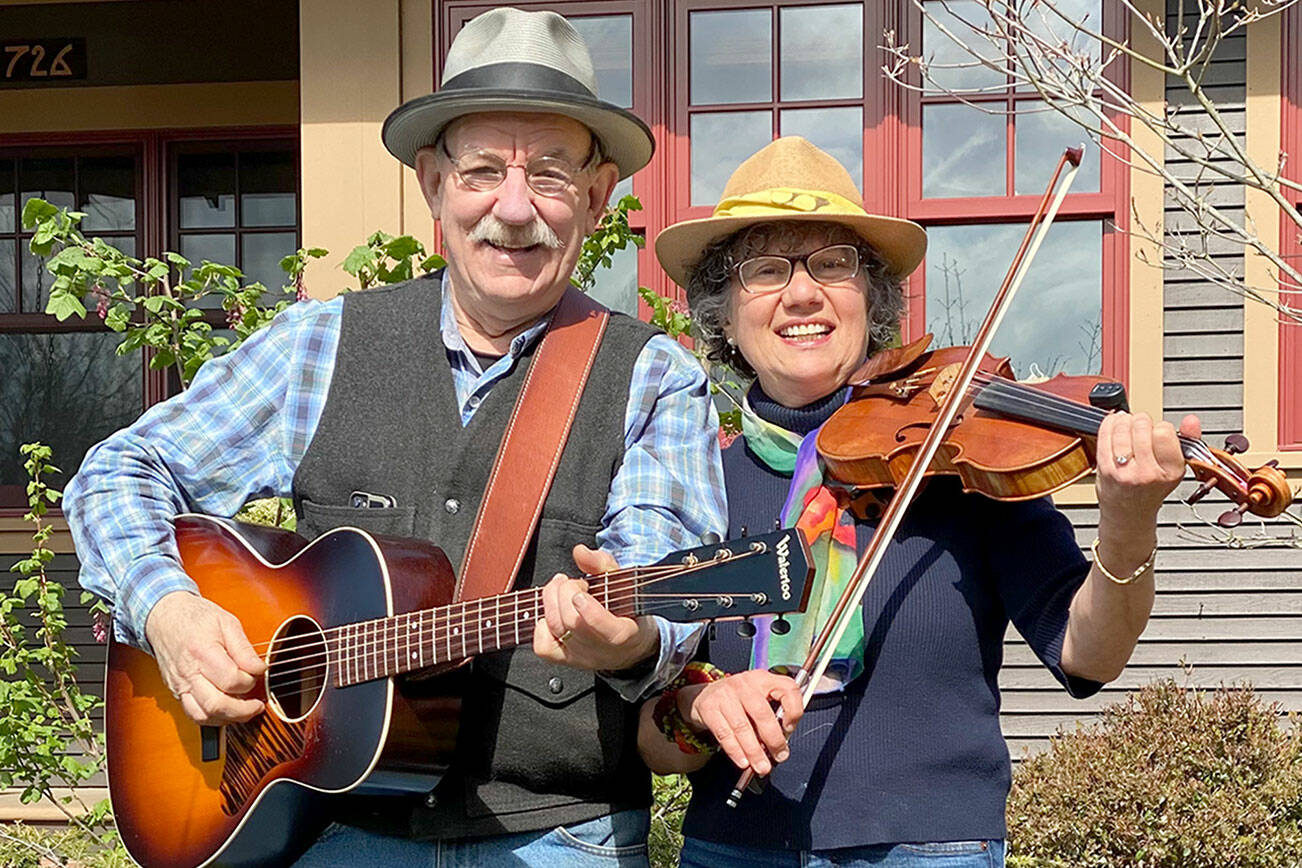 Jere Canote, left, and Bobbi Nikles will perform fiddle tunes, antique swing, blues and country songs at Candlelight Concerts on Thursday.