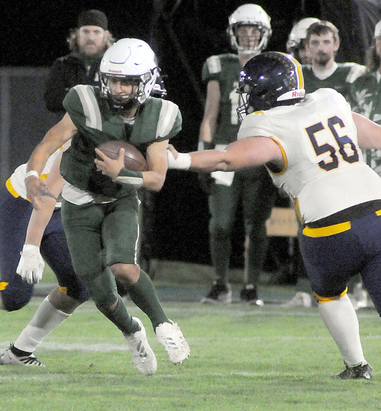 KEITH THORPE/PENINSULA DAILY NEWS 
Port Angeles Kason Albaugh runs with the ball during an October 2023 contest.The Riders would have a different playoff foe under the Round of 32 district crossover plan to take effect this fall.