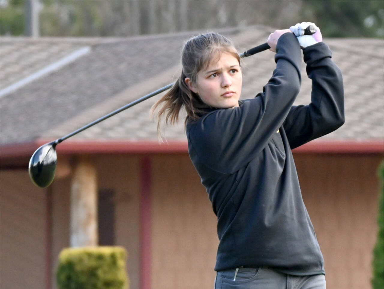 Sequim's Raimey Brewer qualified for the 2A state girls golf tournament. Here, she is competing earlier in the season against Bainbridge. (Michael Dashiell/Olympic Peninsula News Group)