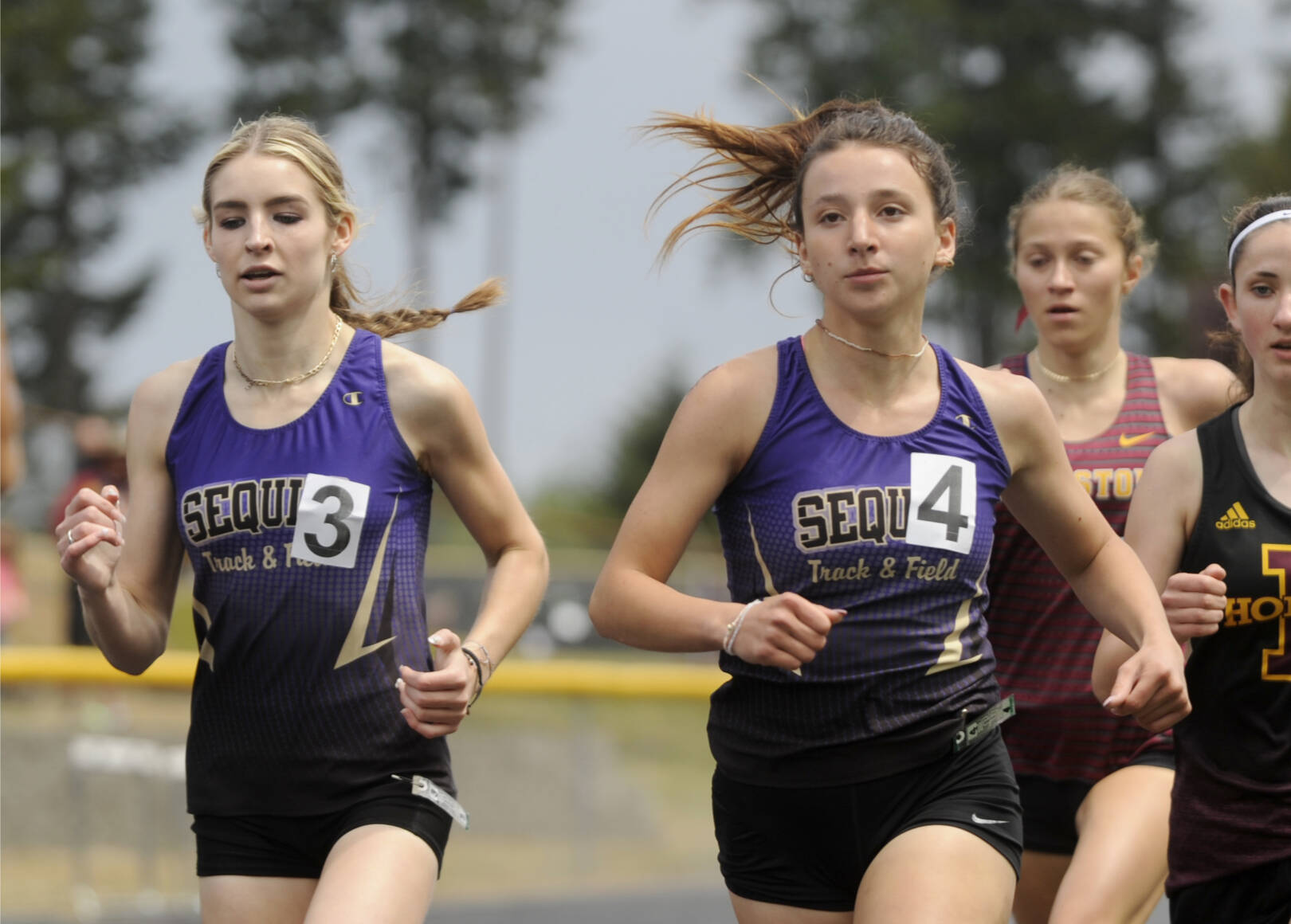 Sequim's Dawn Hulstedt, left, and Kaitlyn Bloomenrader will run in the 800 at state at Mount Tahoma Stadium this weekend. Bloomenrader finished third and Hulstedt fourth at the district meet. (Michael Dashiell/Olympic Peninsula News Group)