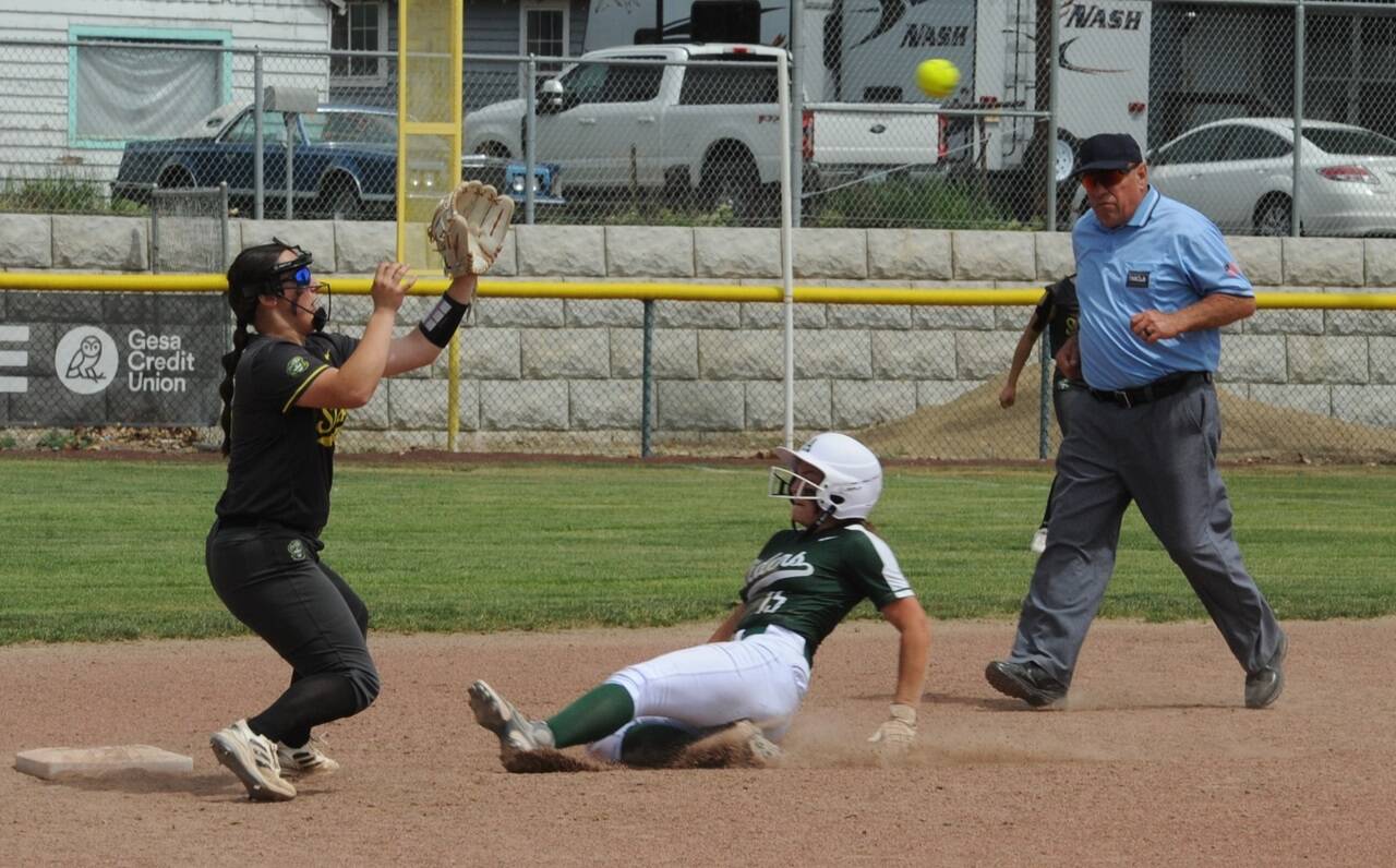 Port Angeles' Kennedy Rognlien slides in to base against Shadle Park on Friday. The Riders beat Shadle Park 10-9, then went on to beat Lynden in the quarterfinals Friday in Selah. (Lonnie Archibald/for Peninsula Daily News)