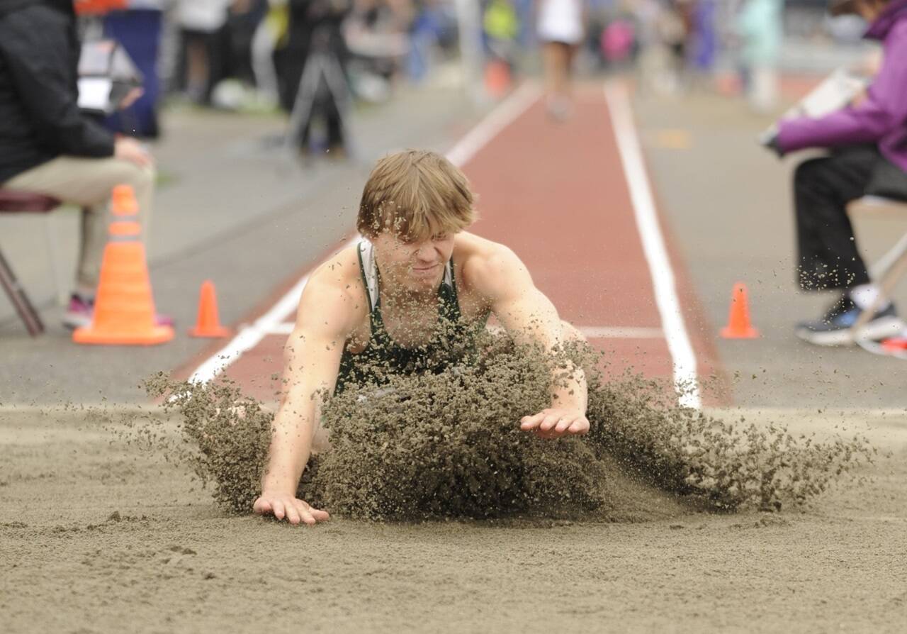 Port Angeles' Parker Nickerson competes in the long jump this weekend at Mount Tahoma. (Michael Dashiell/Olympic Peninsula News Group)