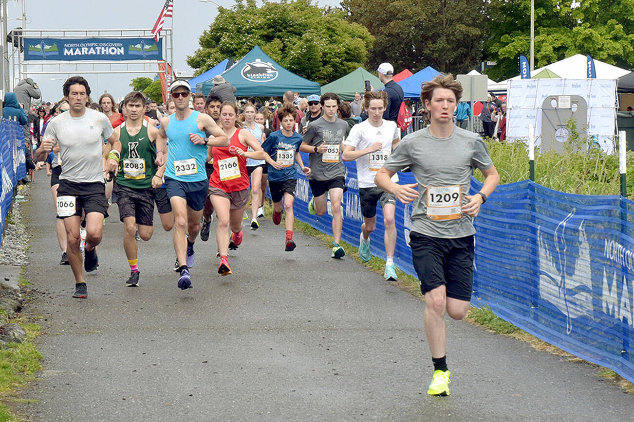 KEITH THORPE/PENINSULA DAILY NEWS
Participants in the North Olympic Discovery Marathon OMC 5K/10K race take off from the start at Port Angeles City Pier on Saturday.