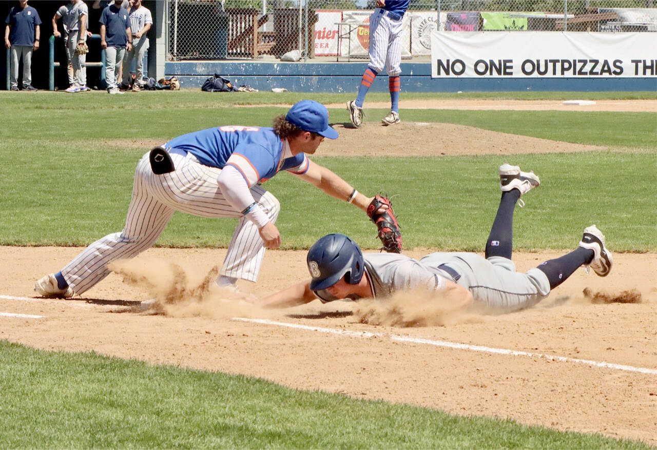 Jeremy Giesegh of the Port Angeles Lefties, playing first base, tags a Bellingham runner during a pickoff attempt Sunday at Civic Field. Giesegh, who is batting .373, was selected to the North team for the West Coast League's first All-Star game since 2019. The game will be played in Bellingham. (Dave Logan/for Peninsula Daily News)