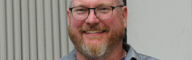Jon Stafford, right, the new director/conductor for the Peninsula Singers, talks with accompanist Mark Johnson. (Peninsula Singers)