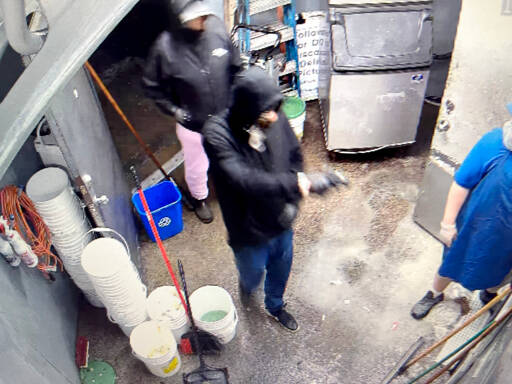 Surveillance footage released by the Clallam County Sheriffs Office shows a suspect allegedly holding a Frugals employee at gunpoint on Thursday. (Clallam County Sheriffs Office)