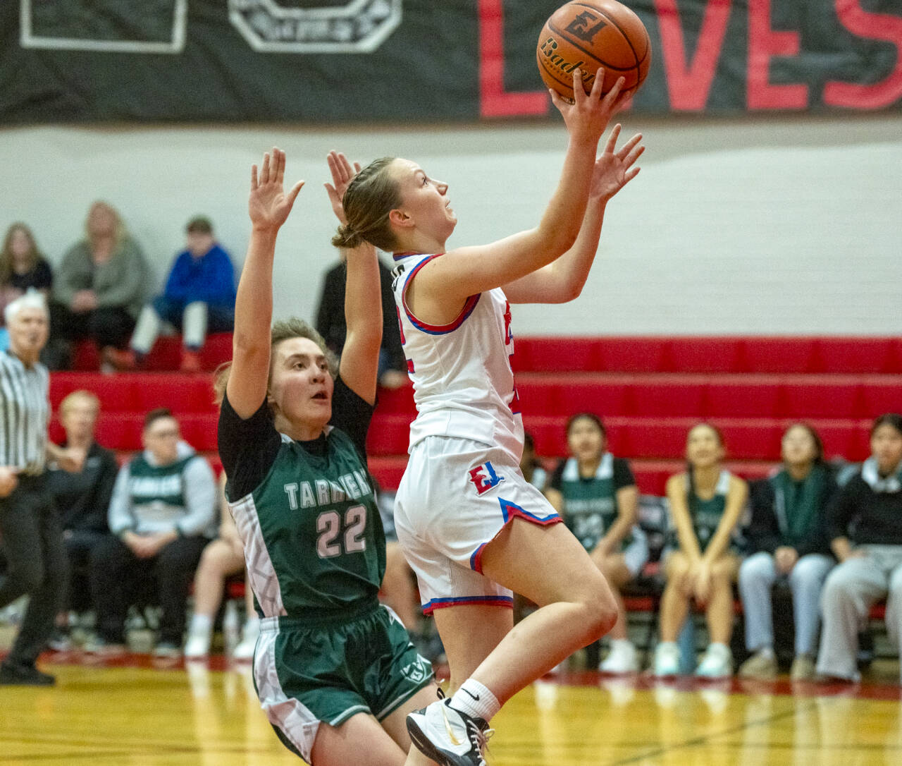East Jeffersons Kaydence Plotner drives for a basket against Charles Wright on Monday. Plotner had 18 points and 12 steals. (Photos by Steve Mullensky/for Peninsula Daily News)
