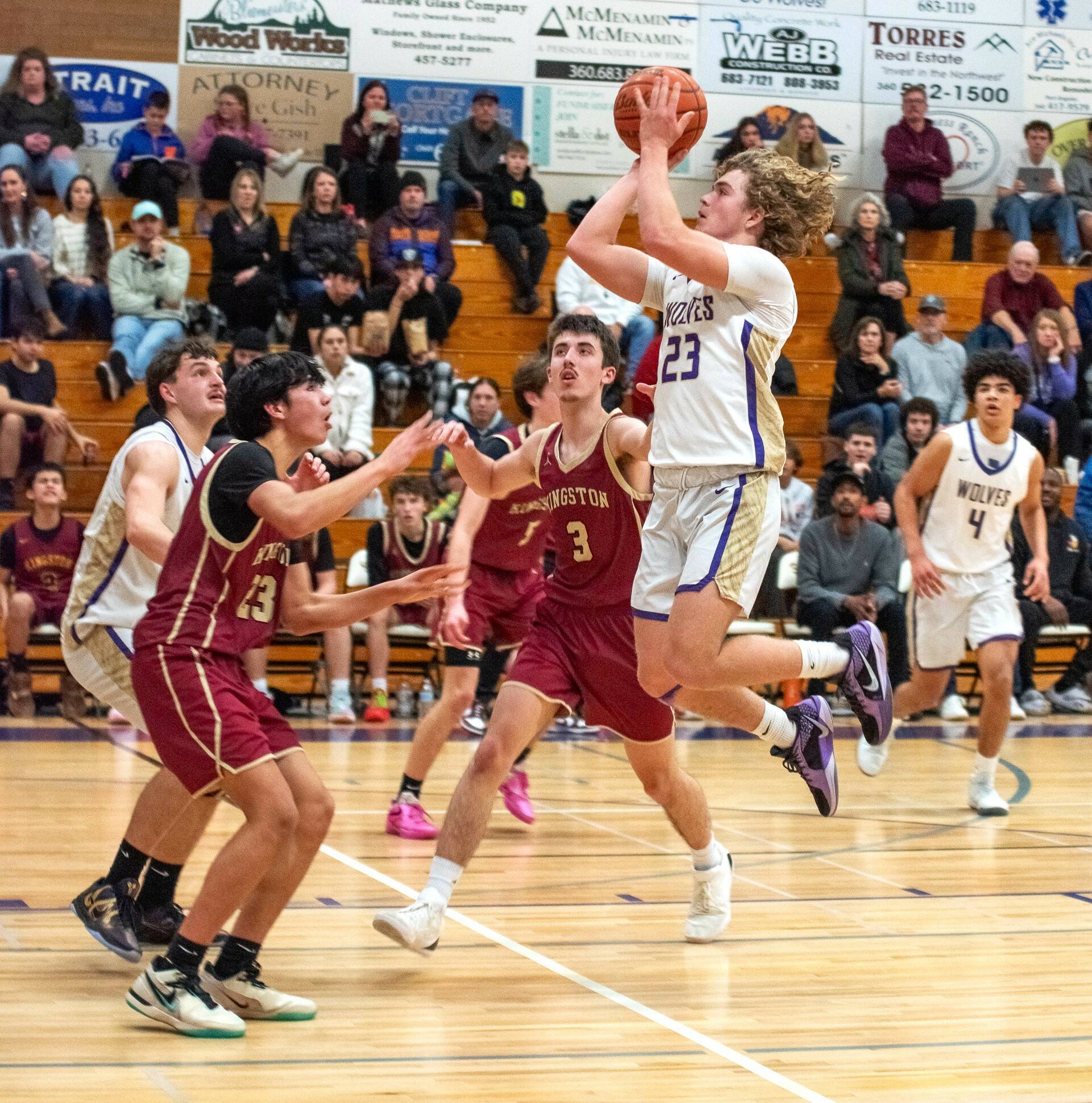 Sequims Zeke Schmadeke (23) goes up for a shot against Kingston on Friday. (Emily Matthiessen/Olympic Peninsula News Group)