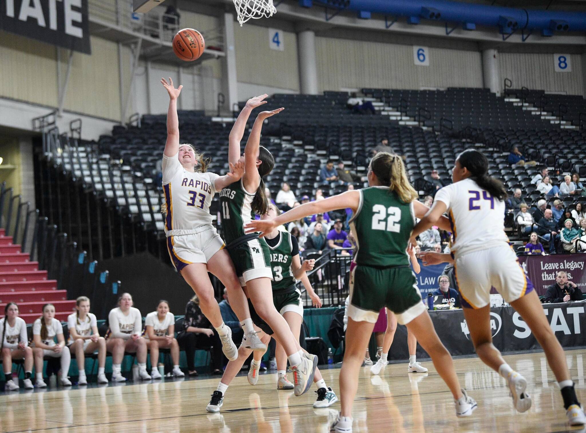 Will Denner/The Columbian
Columbia Rivers Camy Drake (10) goes up for a shot against Port Angeles Lindsay Smith during a Class 2A girls basketball State Round of 12 game at the Yakima Valley SunDome.