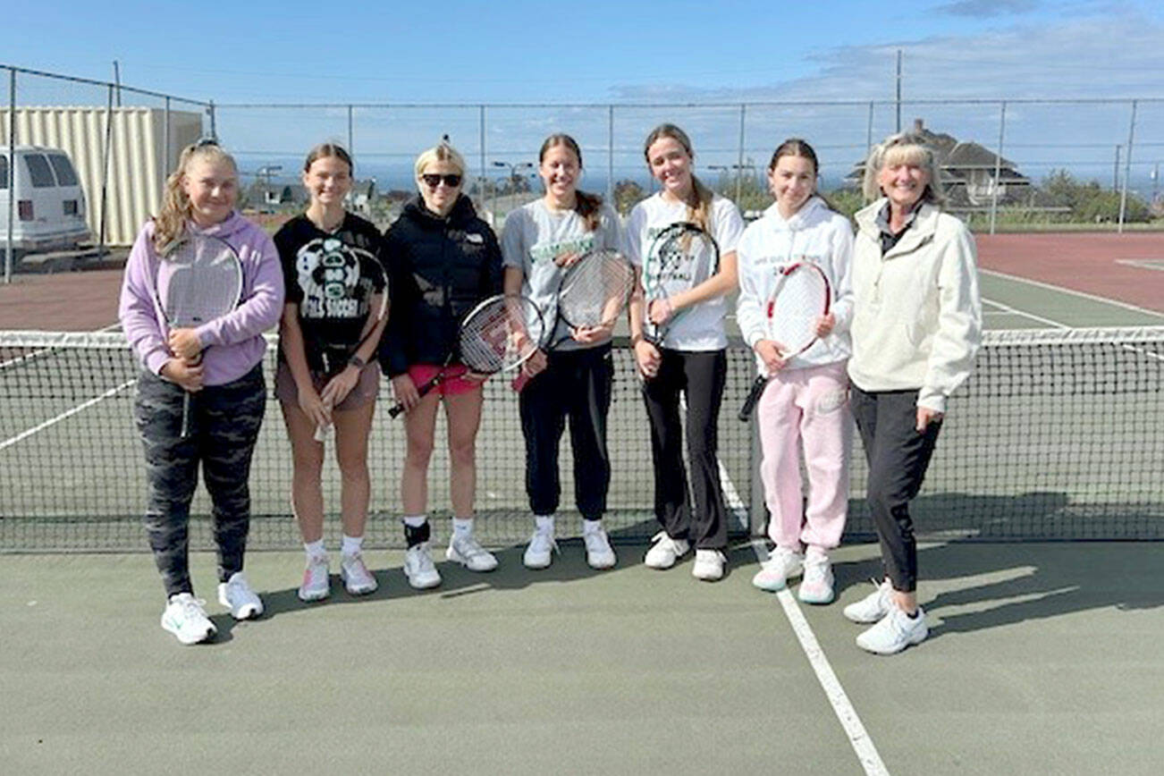 Port Angeles will compete today and Saturday at the Olympic League Girls Tennis Championships at North Kitsap. Competing for the Roughriders are, from left, Bridget Weed (singles), Audrey Rudd (doubles), Pyper Alton (doubles), Cayleigh Alward (doubles), Abby Riffle (doubles), Emma Murray (singles) and head coach Stephanie Gochnour.