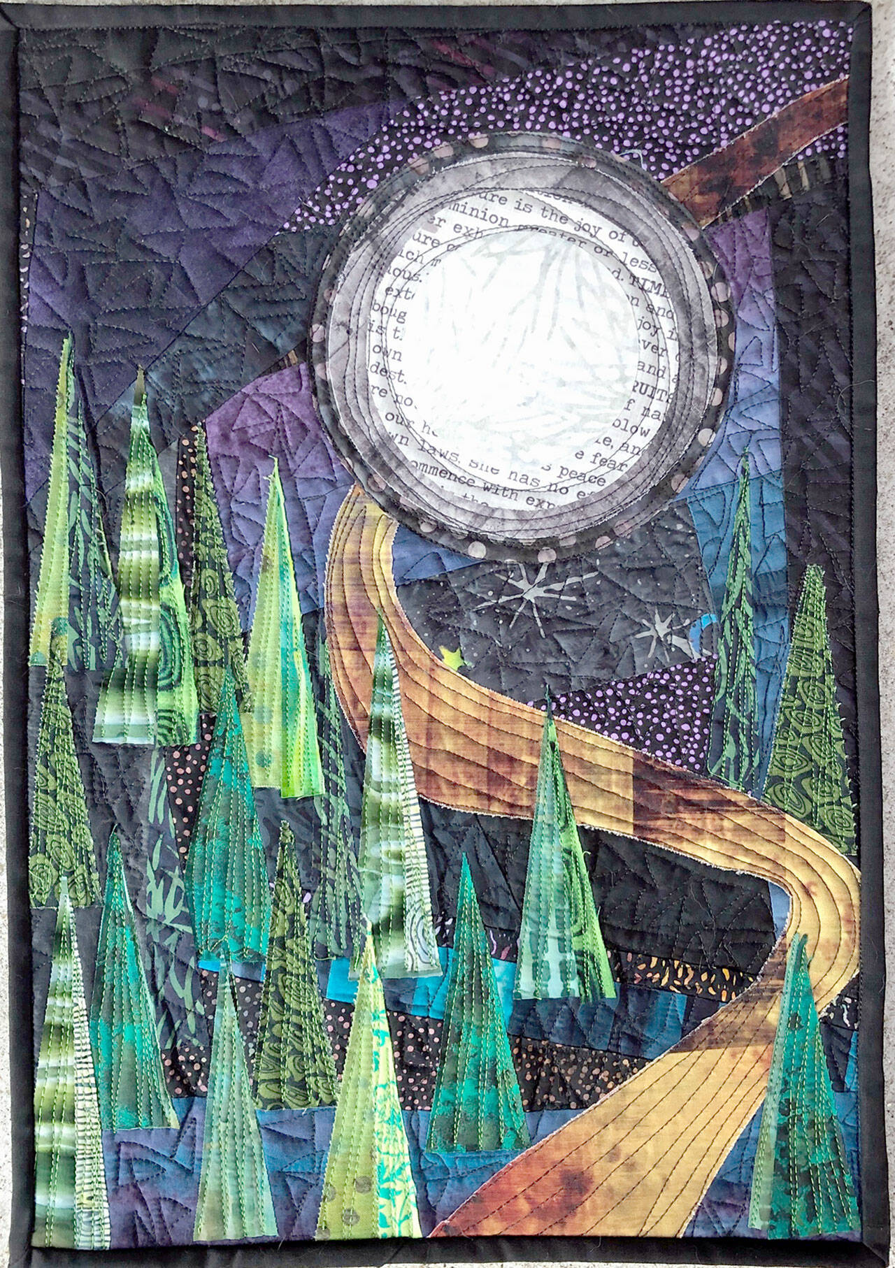 Terri Wolfs art quilt, Moon over Mountains, will be part of the Fiber on the Strait exhibit in the Laura Cooksey Gallery at Field Arts & Events Hall.