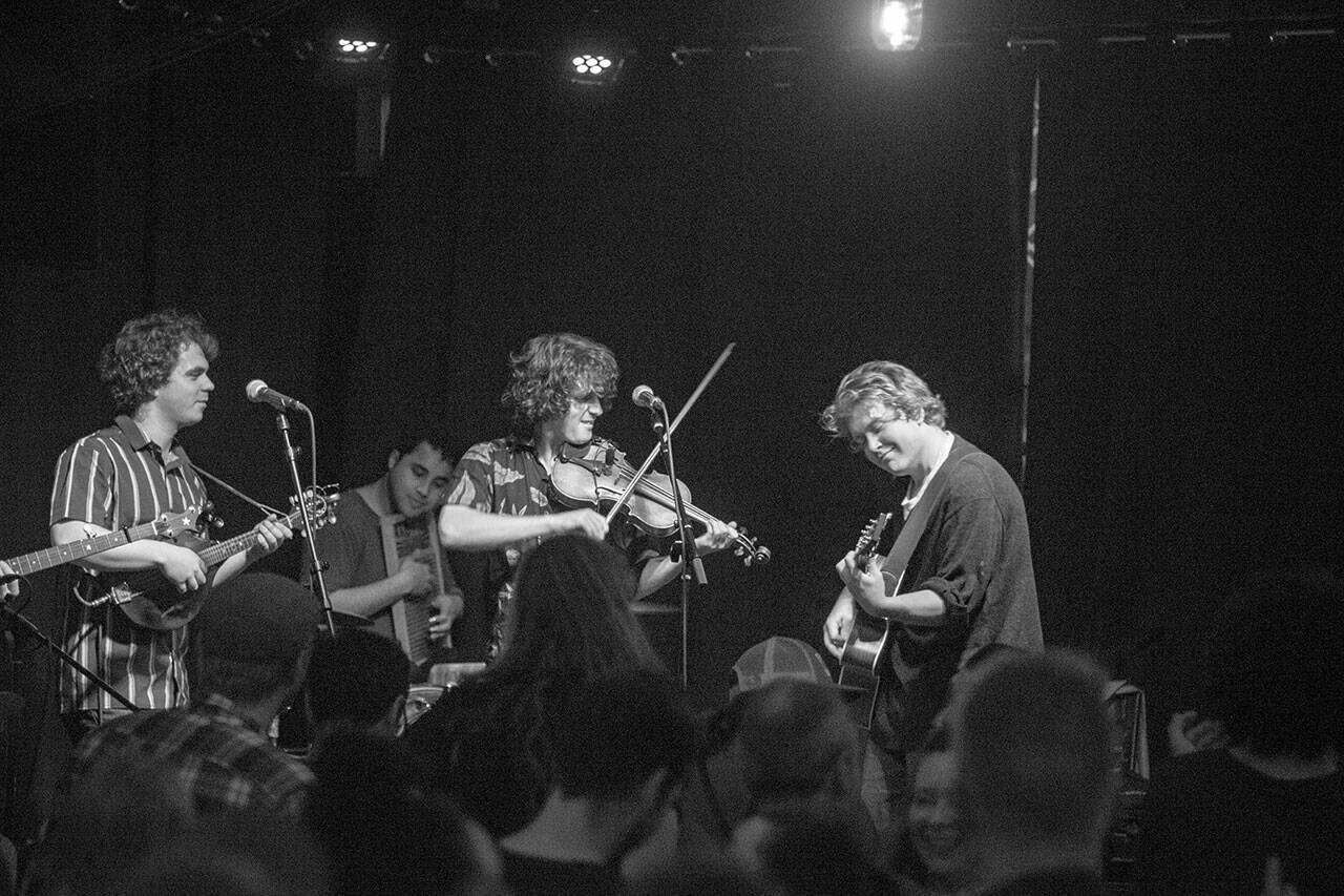 From left to right, Collin McAvinchey, Adam Amr, Joey Gish and Will Jevne of Sweater Weather Stringband will host Olympickin’ at the Quilcene Lantern on Saturday.