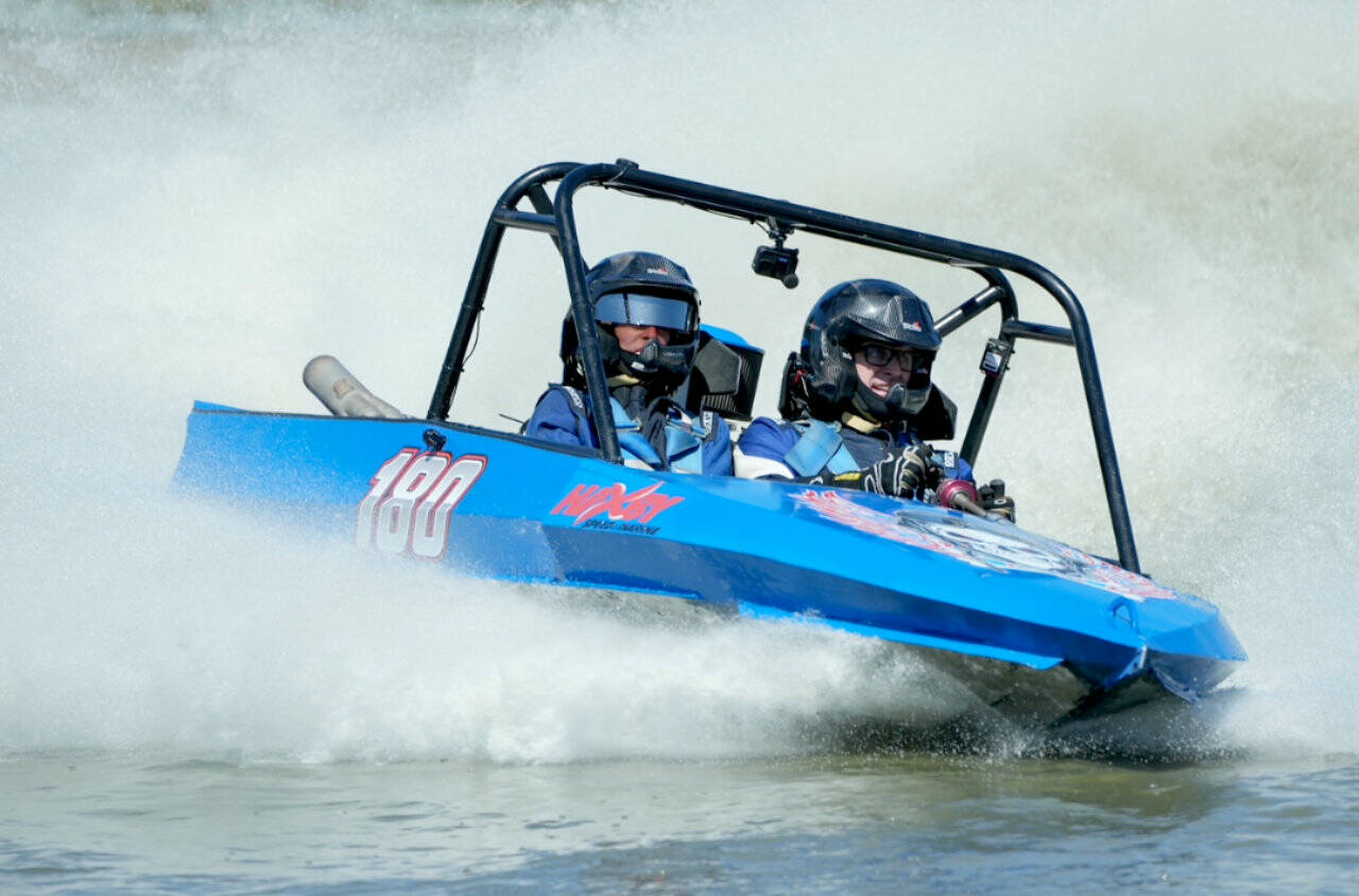 The Jolly Rogers 180 boat driven by Eric Werner and navigated by Jen Farmer, here racing in Port Angeles in July, won the 400 class at the American Sprint Boat Race event held this weekend at the Extreme Sports Park. It was the fifth race that the Jolly Rogers 180 boat won this summer. (Jeff Halstead/for Peninsula Daily News)