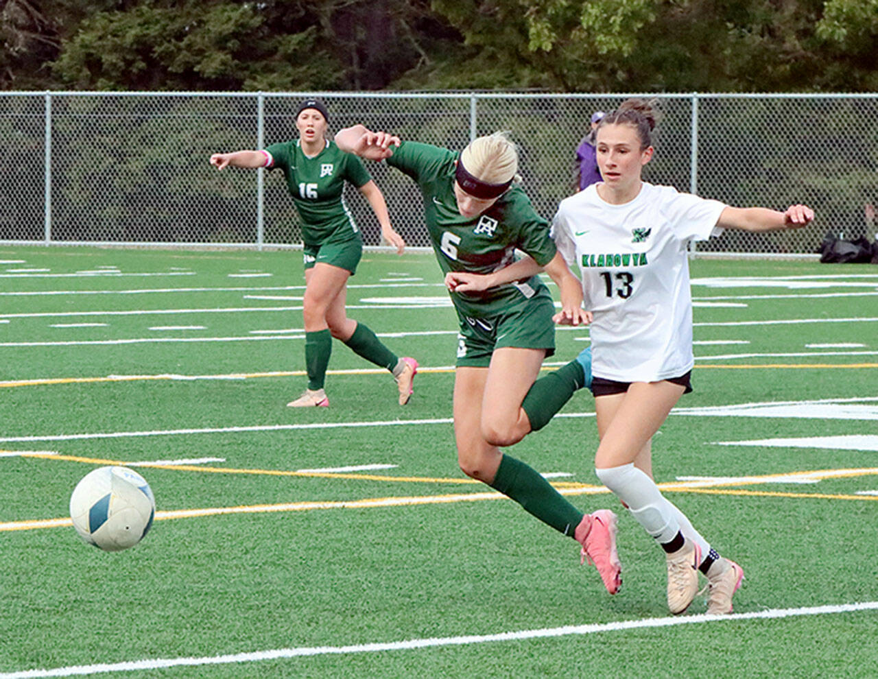 Dave Logan/for Peninsula Daily News Port Angeles Pyper Alton (6) battles Klahowyas Sylvia Kemp for the ball Monday at the Monroe Playfield. In the background is Port Angeles Alayna Marazon (16). Port Angeles won 2-1 on a late goal by Mariah Traband.