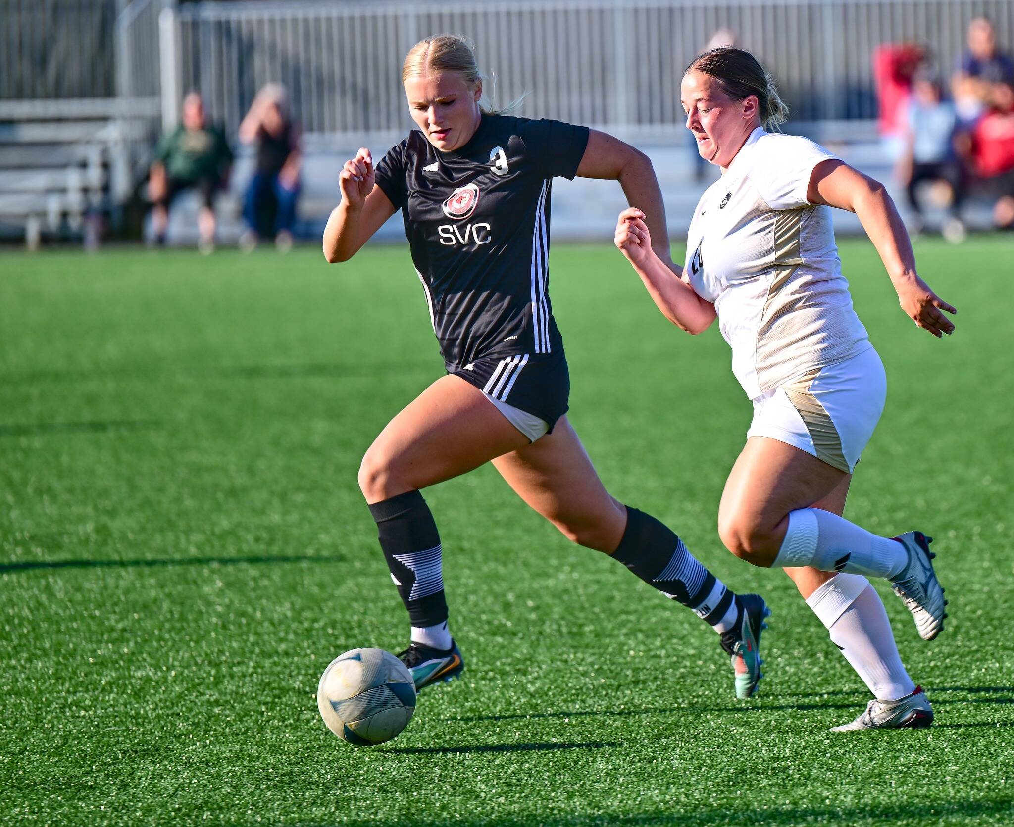 Jay Cline/Peninsula College Athletics 
Peninsula’s Grace Widergren, right, chases down a ball while attempting to hold off Skagit Valley’s Paige Mason during Wednesday’s contest at Wally Sigmar Field. Mason is a 2024 Port Angeles High School graduate and former Roughriders soccer standout. The top-ranked Peninsula Pirates women’s soccer team snapped its 10-game home winning streak at Wally Sigmar Field with a 1-1 draw against Skagit Valley on Wednesday. 
Shiori Shintaku scored an unassisted goal in the 14th minute, but the Cardinals equalized early in the second half and held off Peninsula despite the Pirates’ 29-5 edge in shots and 9–0 advantage in corner kicks. 
Peninsula’s unbeaten and untied streak dated back to a 0-0 draw with Skagit Valley on Sept. 27, 2023.