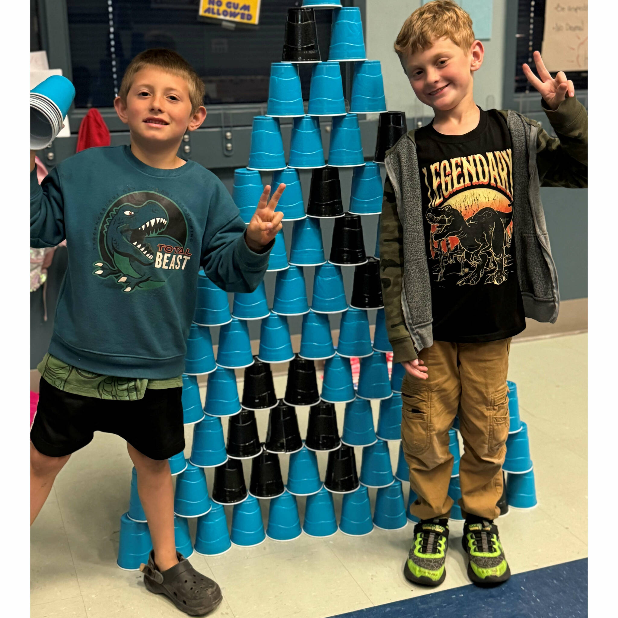 Brandon Layman, left, and Jaxon Dunn celebrate their achievement in the Project L.A.N.E. Stack Attack challenge. (Boys & Girls Clubs of the Olympic Peninsula)