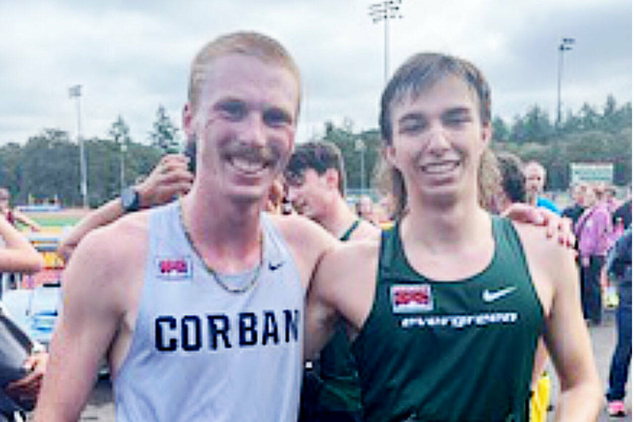 Corban Universitys Jack Gladfelter, left and The Evergreen State Colleges Max Baeder, right, after competing in the Charles Bowles Cross-Country Invitational in Salem, Ore., last week. (Joe Gladfelter)