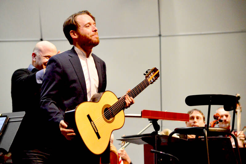 Guest soloist Colin Davin, rehearsing with the Port Angeles Symphony in 2023, will return to the Peninsula for solo recitals in Port Angeles on Friday and in Sequim on Saturday. (Diane Urbani de la Paz)