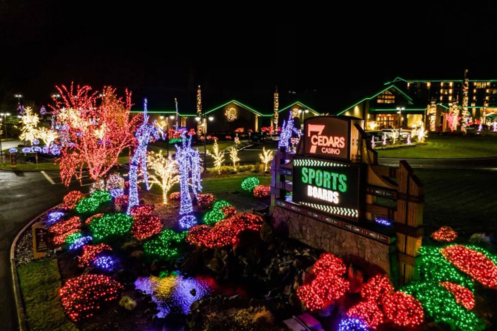 Every holiday season, crews string colorful Christmas lights on every shrub and tree at 7 Cedars and other Jamestown S’Klallam Tribe properties. (Patrick Walker/Olympic Peninsula News Group file)
