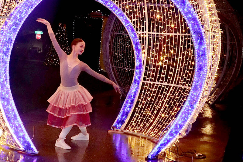 The 35th Festival of Trees had its Gala Opening on Tuesday outside the Vern Burton Community Center in Port Angeles. The Port Angeles City Ballet performed the history of the Nutcracker Ballet through narration and dance inside LED-lighted Christmas ornaments. (Dave Logan/for Peninsula Daily News)