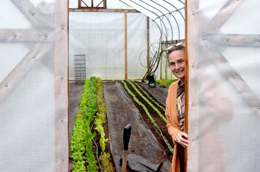 Port Townsend School District’s Food Service Director Shannon Gray in the Salish Coast production garden’s hoop house. (Elijah Sussman/Peninsula Daily News)
