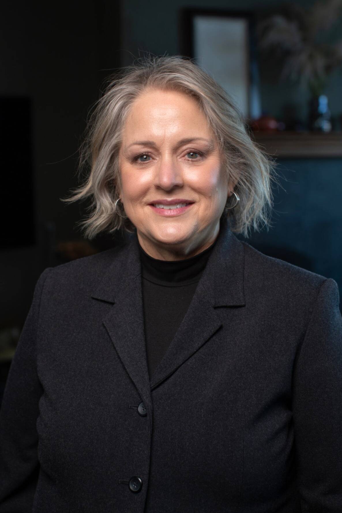 Andra Smith, Sequim Food Banks executive director, will take a job in February with the Washington Food Coalition, helping more than 300 hunger-relief agencies across the state with networking, finding new resources and understanding legislation. (Silas Crews)