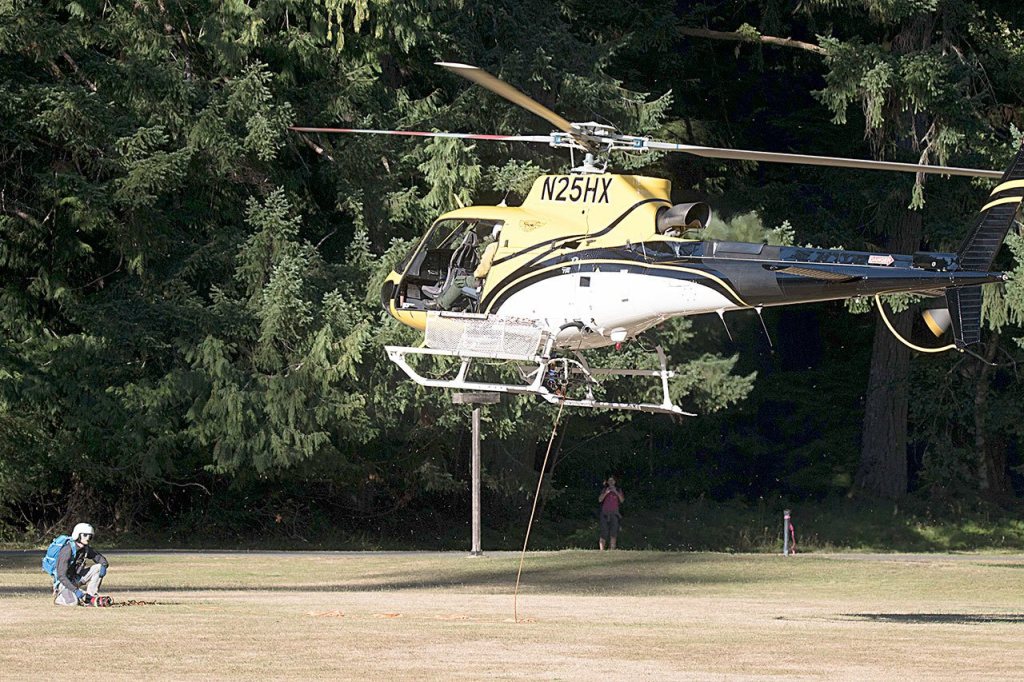 A Mount Rainier National Park helicopter takes off to help injured hiker Anita Benitez on the Pyramid Peak Trail. (William Morris)