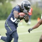 Seattle Seahawks&rsquo; Alex Collins in action during the team&rsquo;s NFL football training camp Saturday, July 30, 2016, in Renton, Wash. (AP Photo/Elaine Thompson)