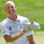 Jim Furyk celebrates after shooting a course and PGA Tour-record 58 during the final round of the Travelers Championship golf tournament in Cromwell, Conn., Sunday, Aug. 7, 2016. (AP Photo/Fred Beckham)