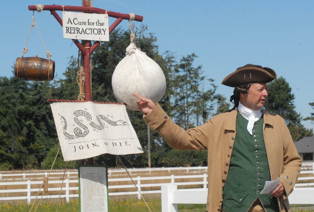 Roger Gary of Onalaska, taking on the role of Capt. McGary, gives a rable-rousing speech against British rule at Saturday&rsquo;s Northwest Colonial Festival. (Keith Thorpe/Peninsula Daily News)
