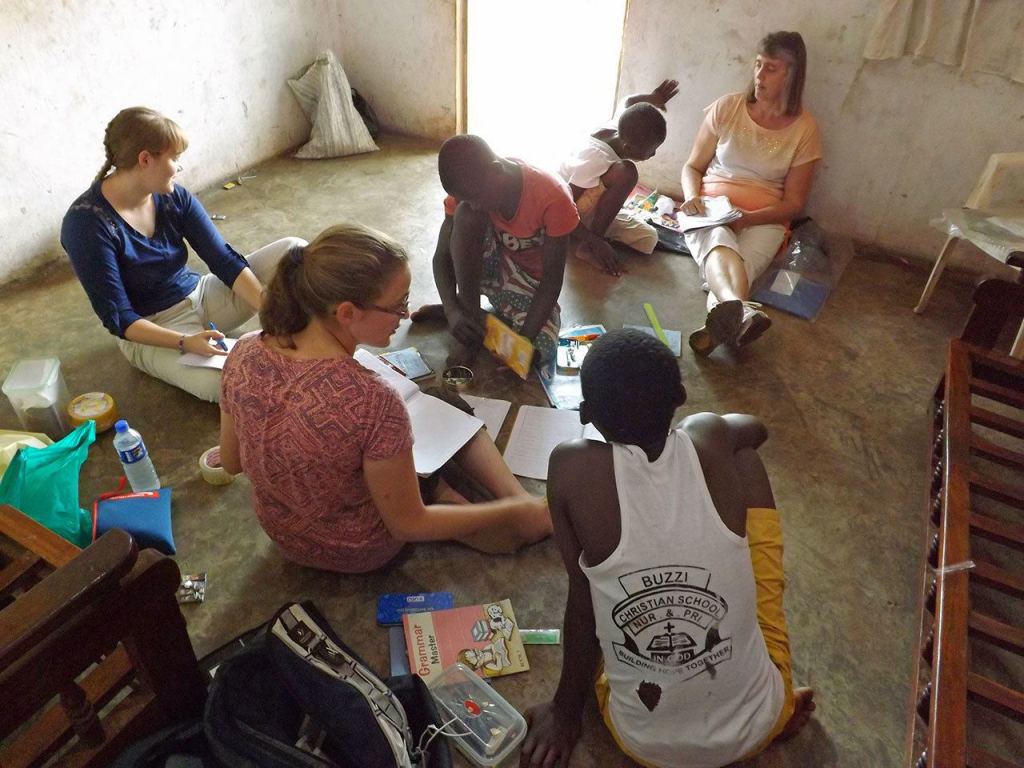 Samantha, Isabel and Becky Lukins interact with &ldquo;street boys&rdquo; at Ashlea Center in Kampala, Uganda. (Julian Lukins)