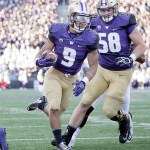 The Associated Press Washington&rsquo;s Myles Gaskin (9) scores against Washington State as Kaleb McGary follows.